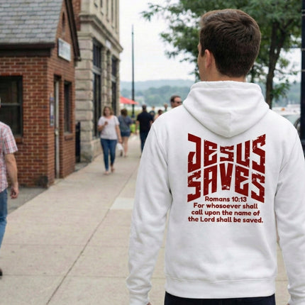 Person wearing a white hoodie with 'Jesus Saves' text on the back, walking down a street.